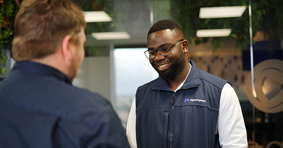 Two operatives having a friendly conversation